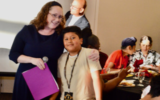 Stephanie Evans congratulating Uriel Matias Salazar